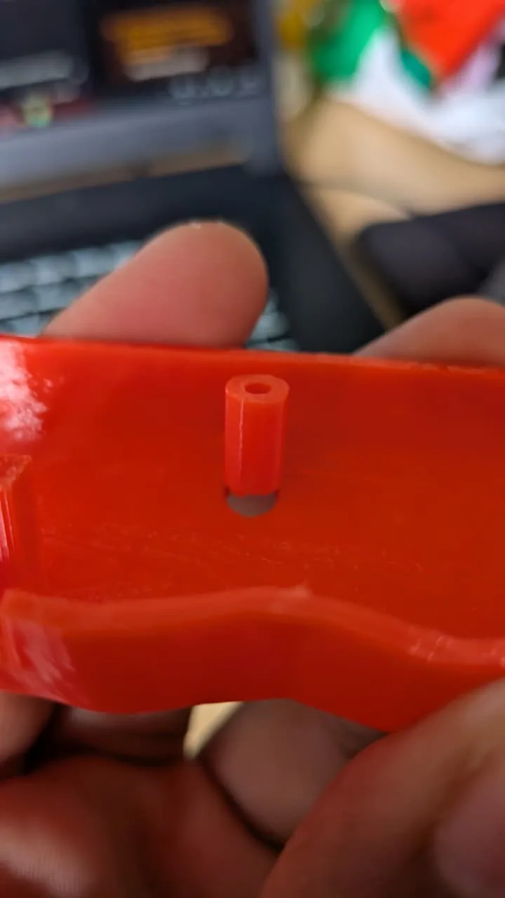 Close-up of the printed screw boss standing on a thin ring